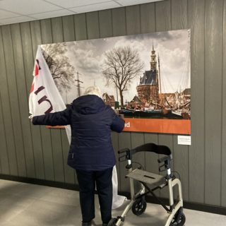 Bewoner onthult fotobord Hoofdtoren 